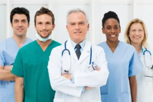 A group of doctors and nurses standing together.